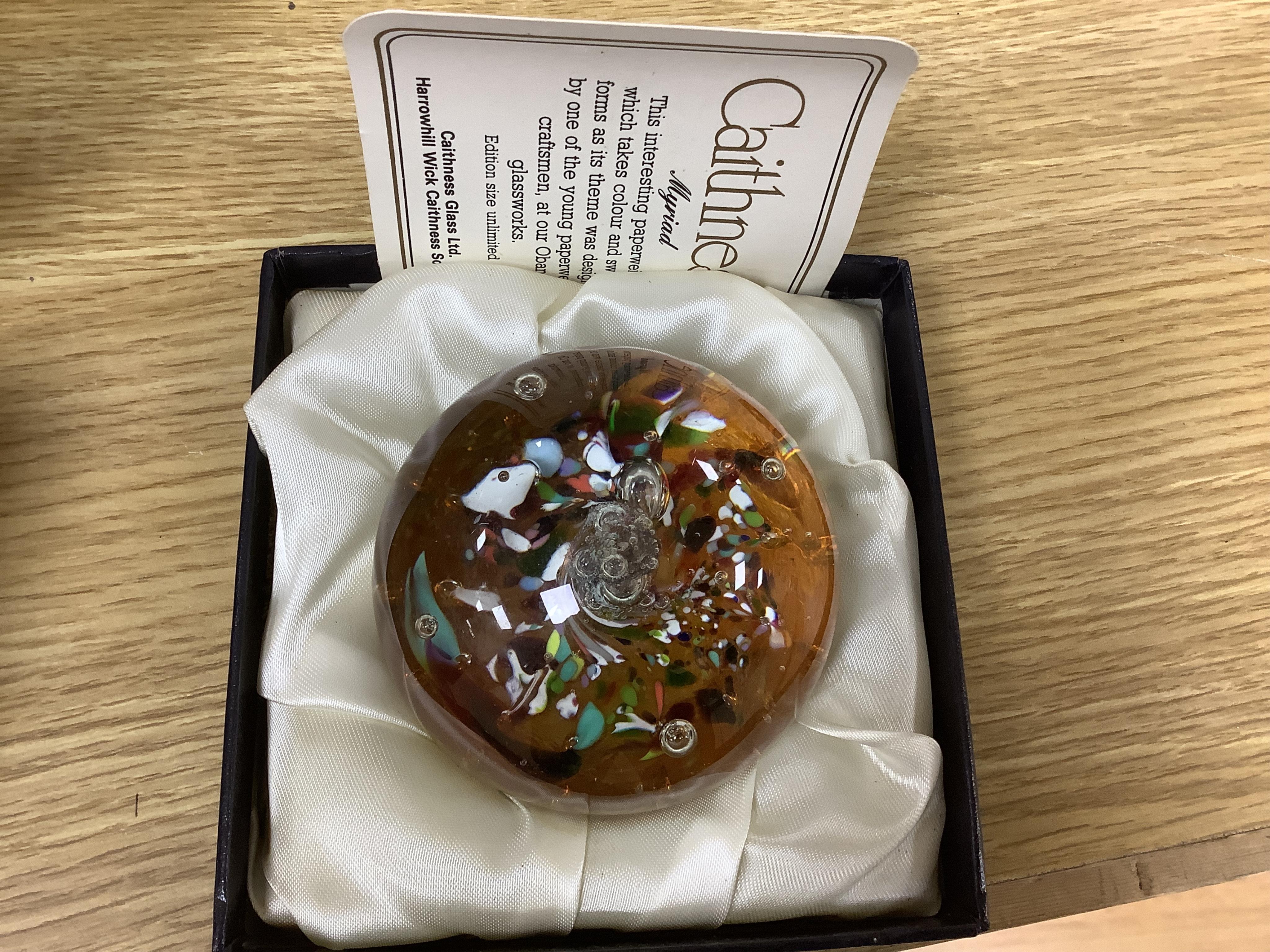 A collection of boxed Whitefriars and Caithness paperweights and others (10)